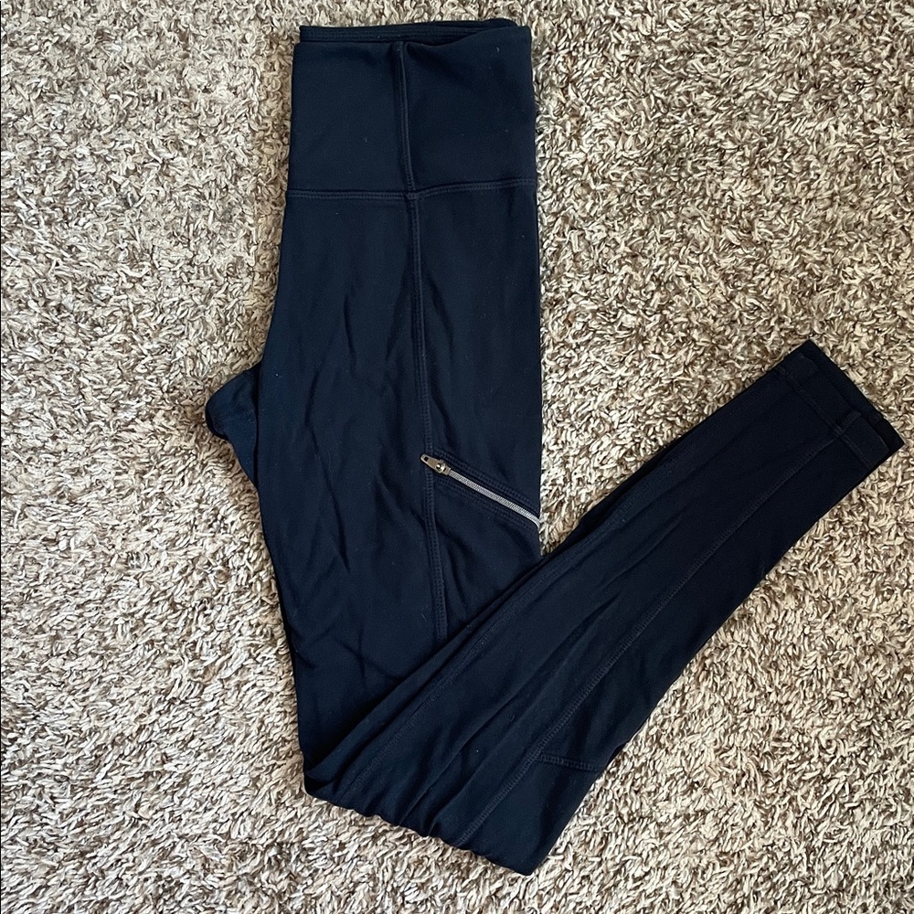 Athleta Black leggings with zipper pockets